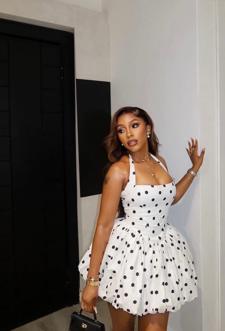 Polka dot mini dress styled for a night out