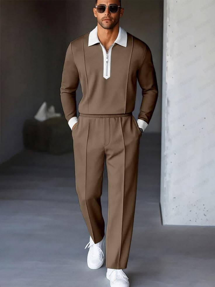 Brown zip polo with a contrast white collar, matched with tailored brown trousers
